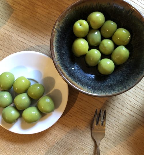 Green olives in a bowl